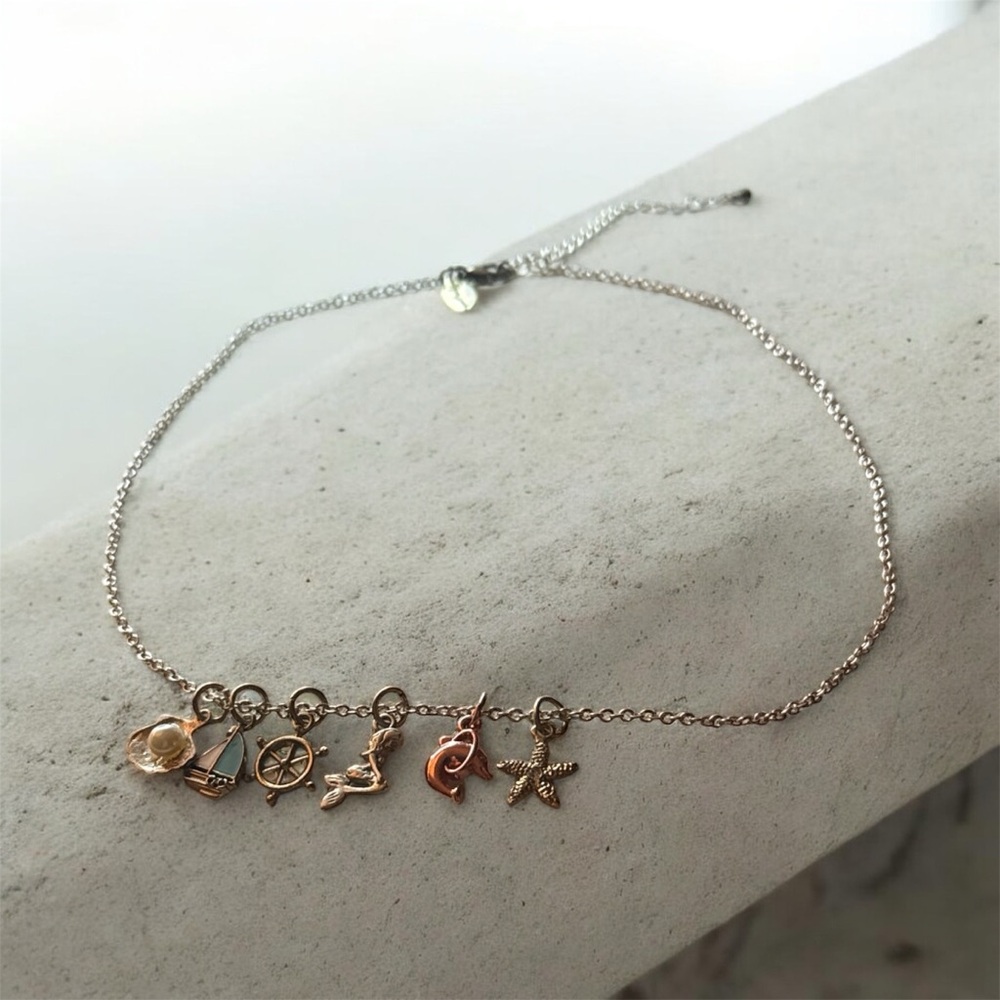 Laura Janelle Multi-charm nautical / ocean theme Necklace-silver. Interchanging